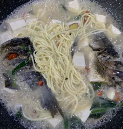 crucian carp tofu soup with noddles crucian carp tofu soup with noddles